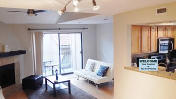 Condo, 1 Queen Bed with Sofa bed, Non Smoking | Living room | Flat-screen TV, fireplace