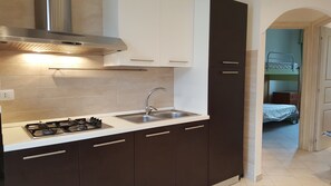 Comfort Apartment, 2 Bedrooms, Terrace, Sea View | Private kitchen - Appartamenti La Ciaccia (Valledoria)