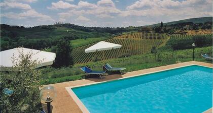 Fireplace, apartment with veranda and view of San Gimignano