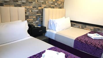 Standard Twin Room | 1 bedroom, in-room safe, bed sheets
