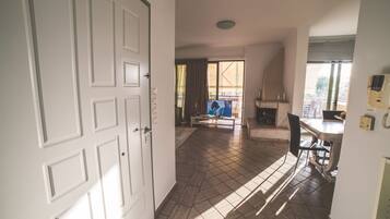Apartment, 2 Bedrooms | Living area | Flat-screen TV, fireplace