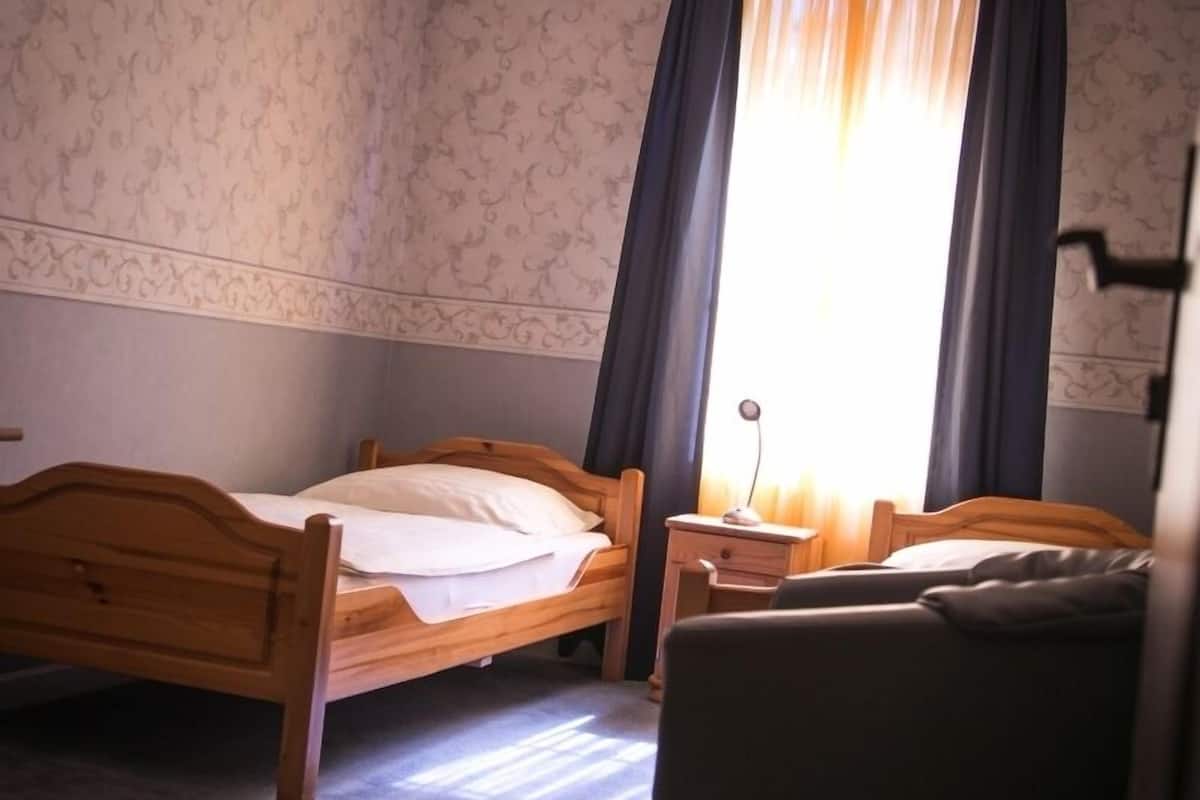 single room | living area | flat-screen tv