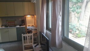 Studio, Ground Floor | Living area | Flat-screen TV - Central Studio (Patras)