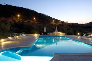 Seasonal outdoor pool, pool umbrellas, pool loungers