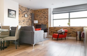 Premier-Apartment, 1 Schlafzimmer, Nichtraucher | Wohnbereich