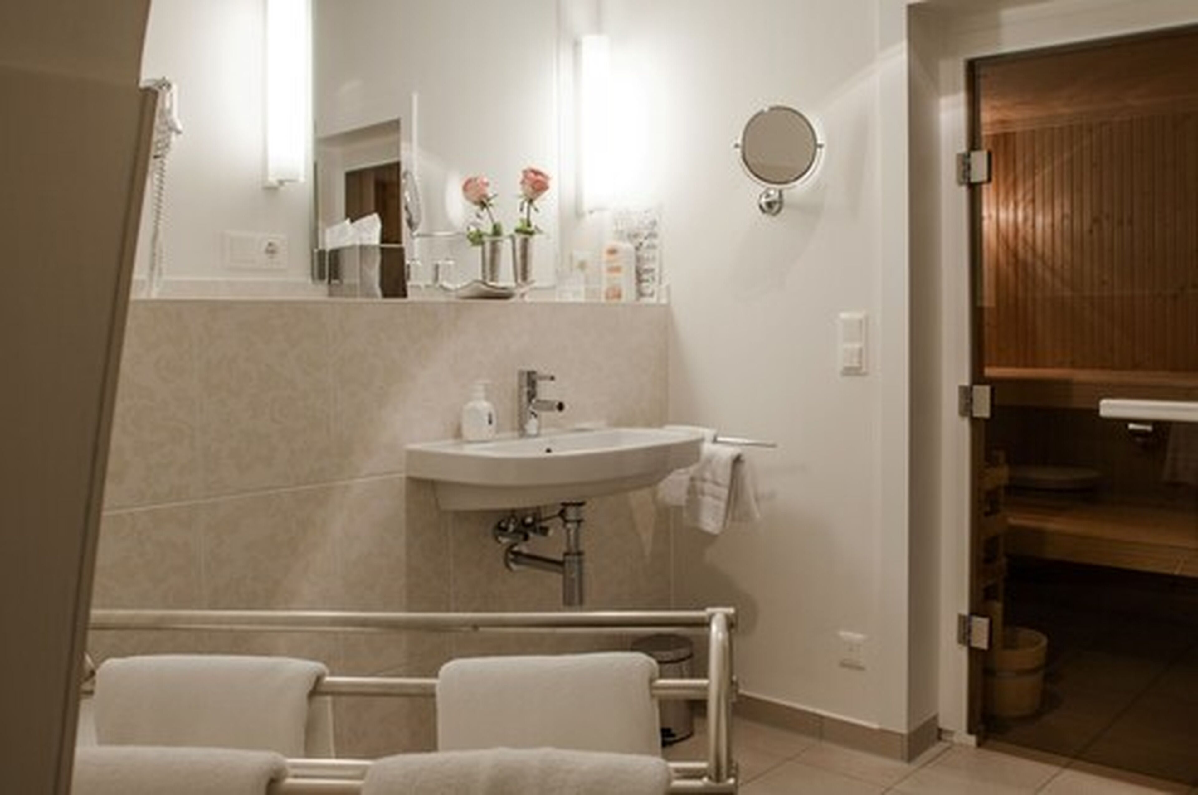 junior suite | bathroom amenities | shower, free toiletries, hair dryer, towels