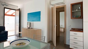Apartment, 2 Bedrooms | Living area | 18-inch TV with satellite channels - Dolce Mare 3 (Modica)