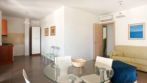 Apartment, 2 Bedrooms | Living area | 18-inch flat-screen TV with satellite channels, TV - Dolce Mare 4 (Modica)