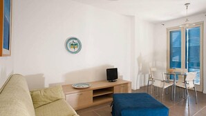 Apartment, 2 Bedrooms | Living area | 18-inch flat-screen TV with satellite channels, TV - Dolce Mare 4 (Modica)