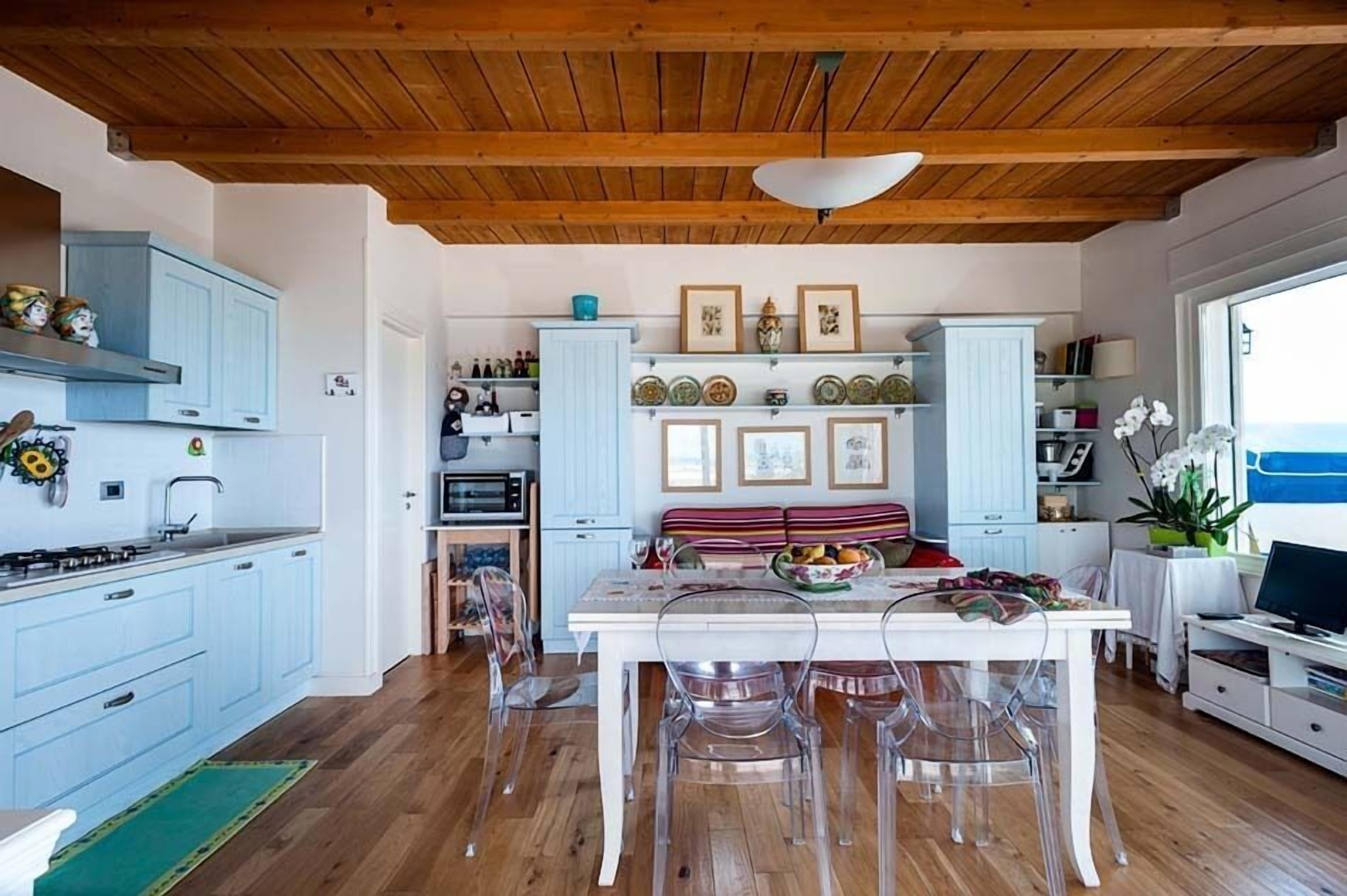 Condo, 2 Bedrooms, Sea View | Private kitchen | Full-sized fridge, oven, stovetop, cookware/dishes/utensils