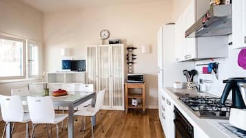 Condo, 2 Bedrooms, Sea View | Private kitchen | Full-sized fridge, oven, stovetop, cookware/dishes/utensils