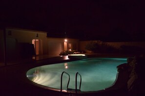 Seasonal outdoor pool, pool loungers