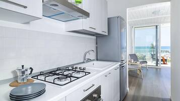 Apartemen, 2 kamar tidur | Dapur pribadi | Lemari es besar, oven, kompor, dan peralatan masak/sendok-piring