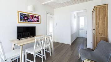 Apartment, 2 Bedrooms | Living room | Flat-screen TV