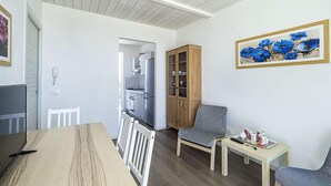 Apartment, 2 Bedrooms | Living room | Flat-screen TV