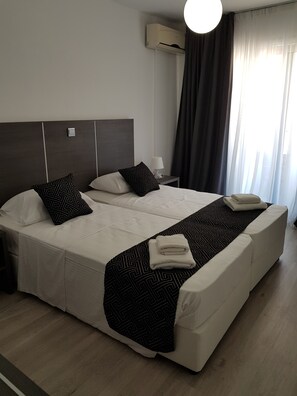 Appartement, 1 slaapkamer | Geluiddichte muren, een strijkplank/strijkijzer, gratis babybedden