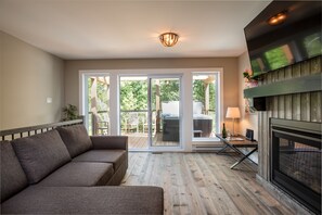 Chalet 2 chambres | Coin séjour | Télévision à écran plat