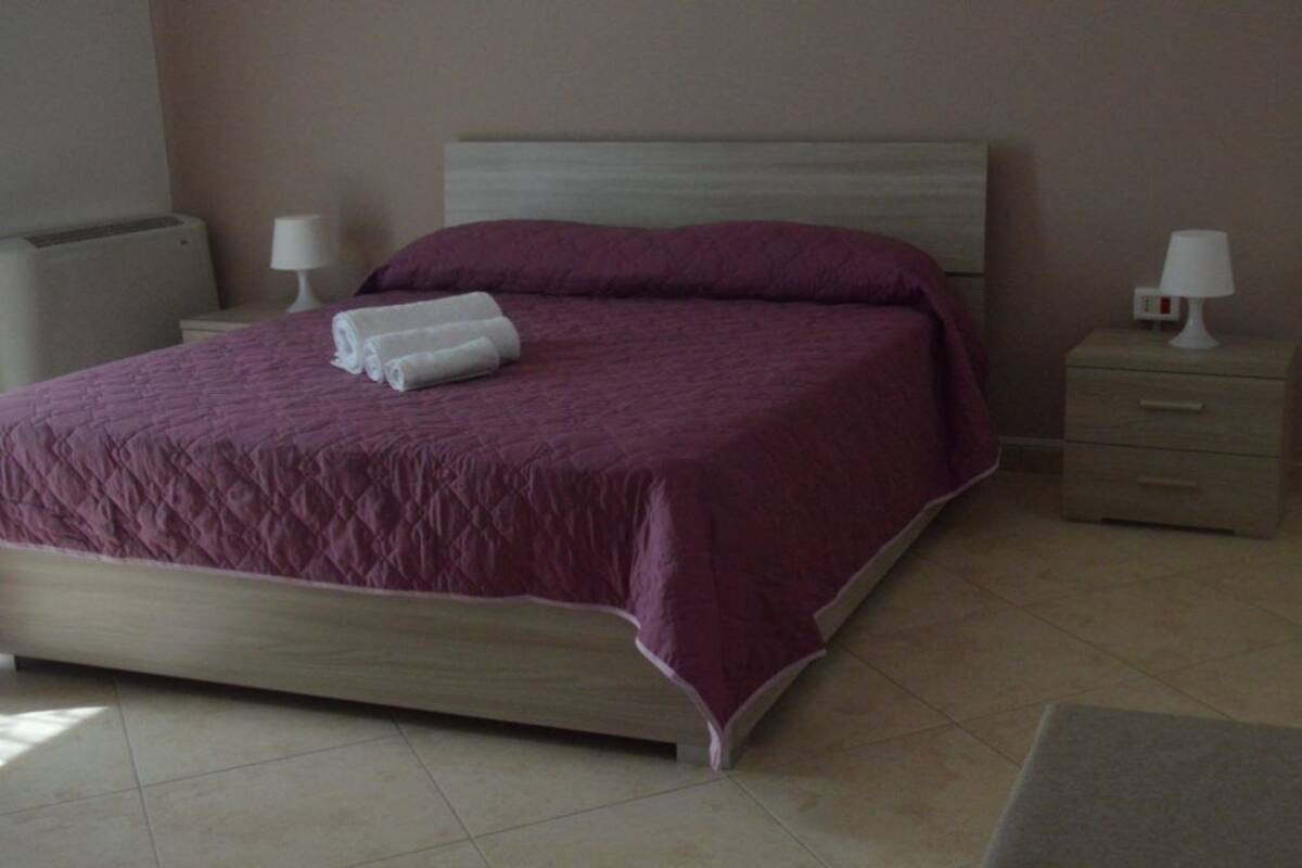 Deluxe Double Room | Iron/ironing board, cots/infant beds, free WiFi, bed sheets