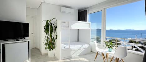 Family Quadruple Room, 1 Bedroom, Sea View | Hypo-allergenic bedding, minibar, in-room safe, individually decorated