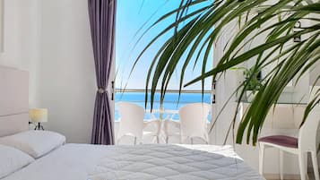 Suite junior, 1 cama Queen size y sofá cama, vista al mar (2) | Ropa de cama hipoalergénica y caja de seguridad en la habitación