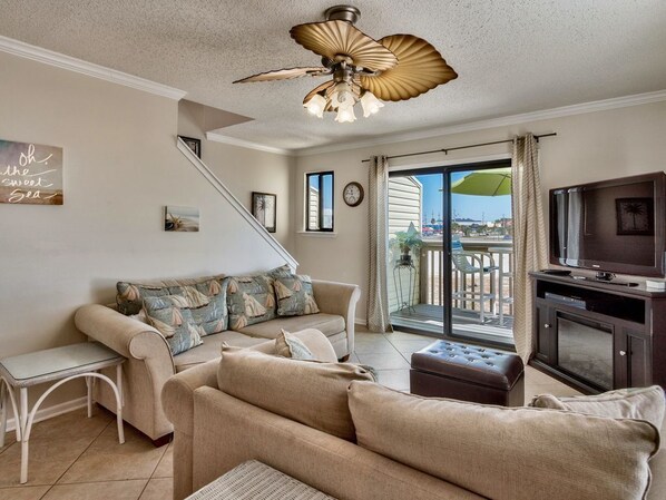 Flat-screen TV, video games, DVD player, books