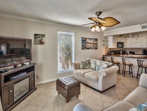 Flat-screen TV, video games, DVD player, books