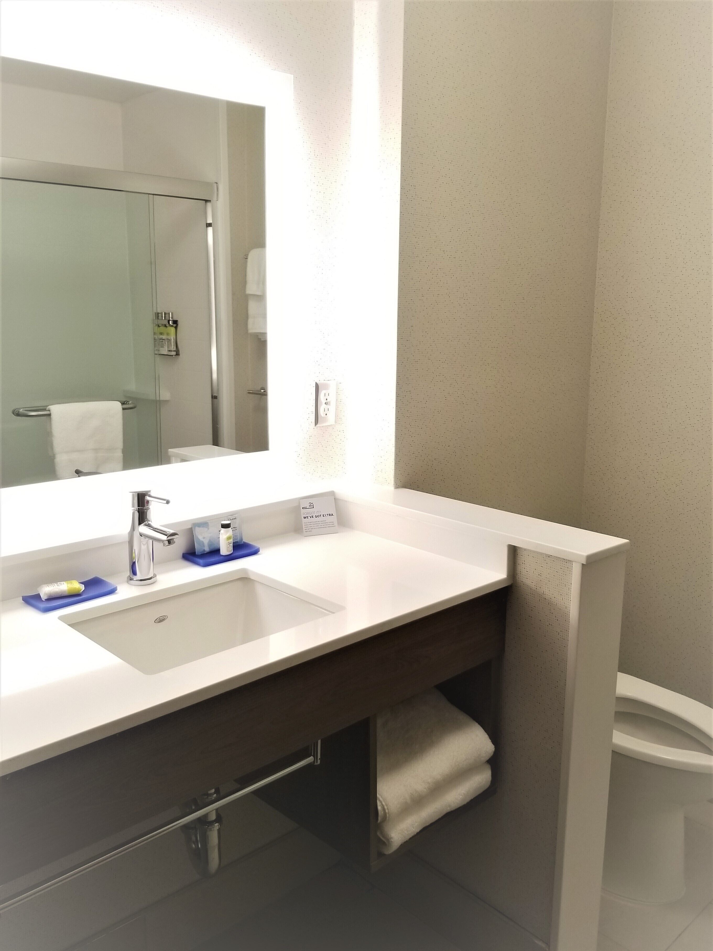 hair dryer, towels, soap, shampoo