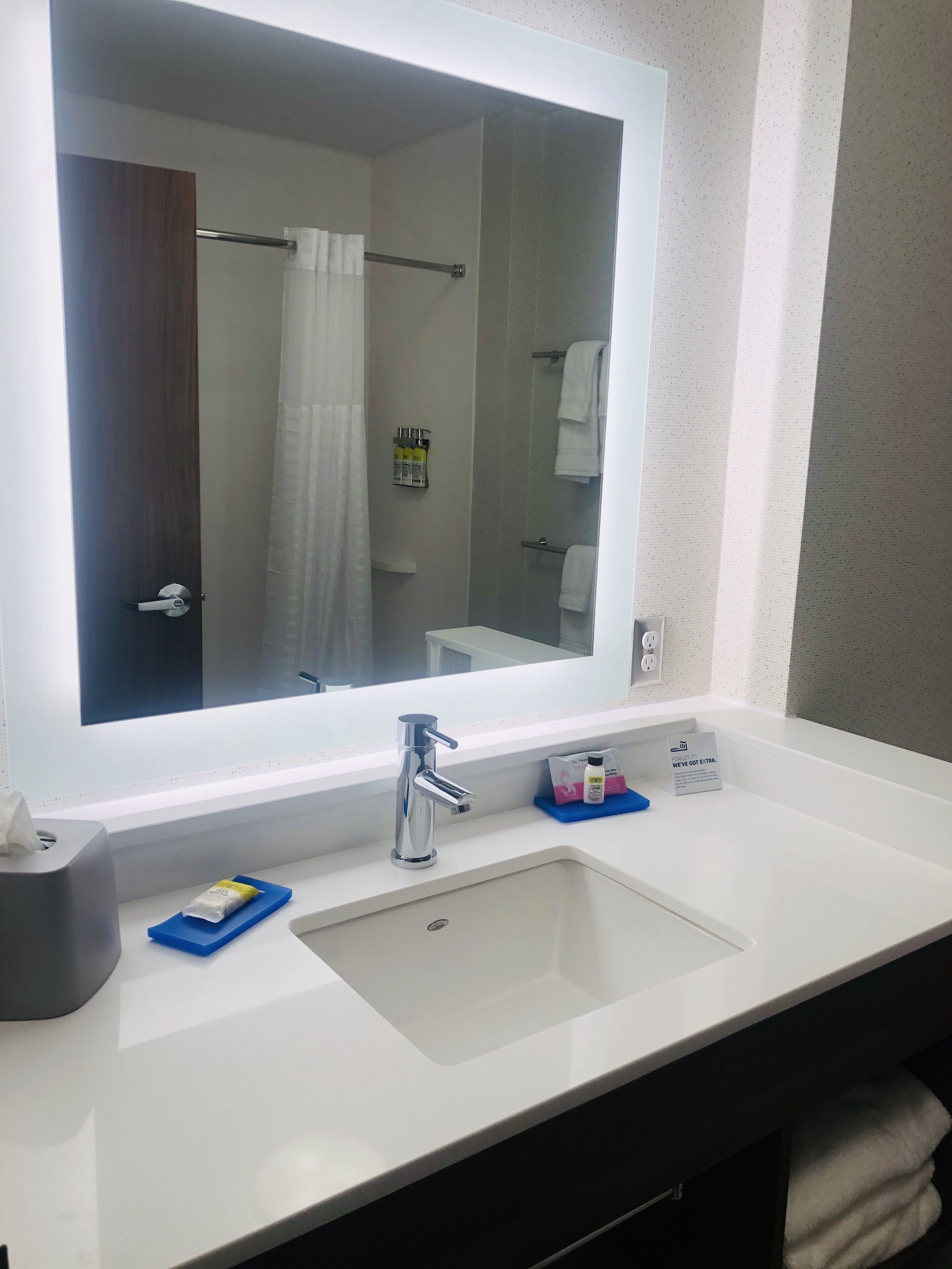 hair dryer, towels, soap, shampoo