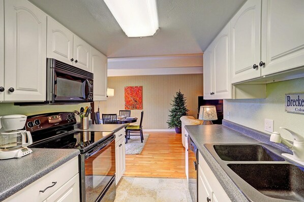 Condo, 2 Bedrooms | Private kitchen | Fridge, microwave, oven, dishwasher - Ski And Racquet Club B106 2 Bedroom Condo by RedAwning (Breckenridge)