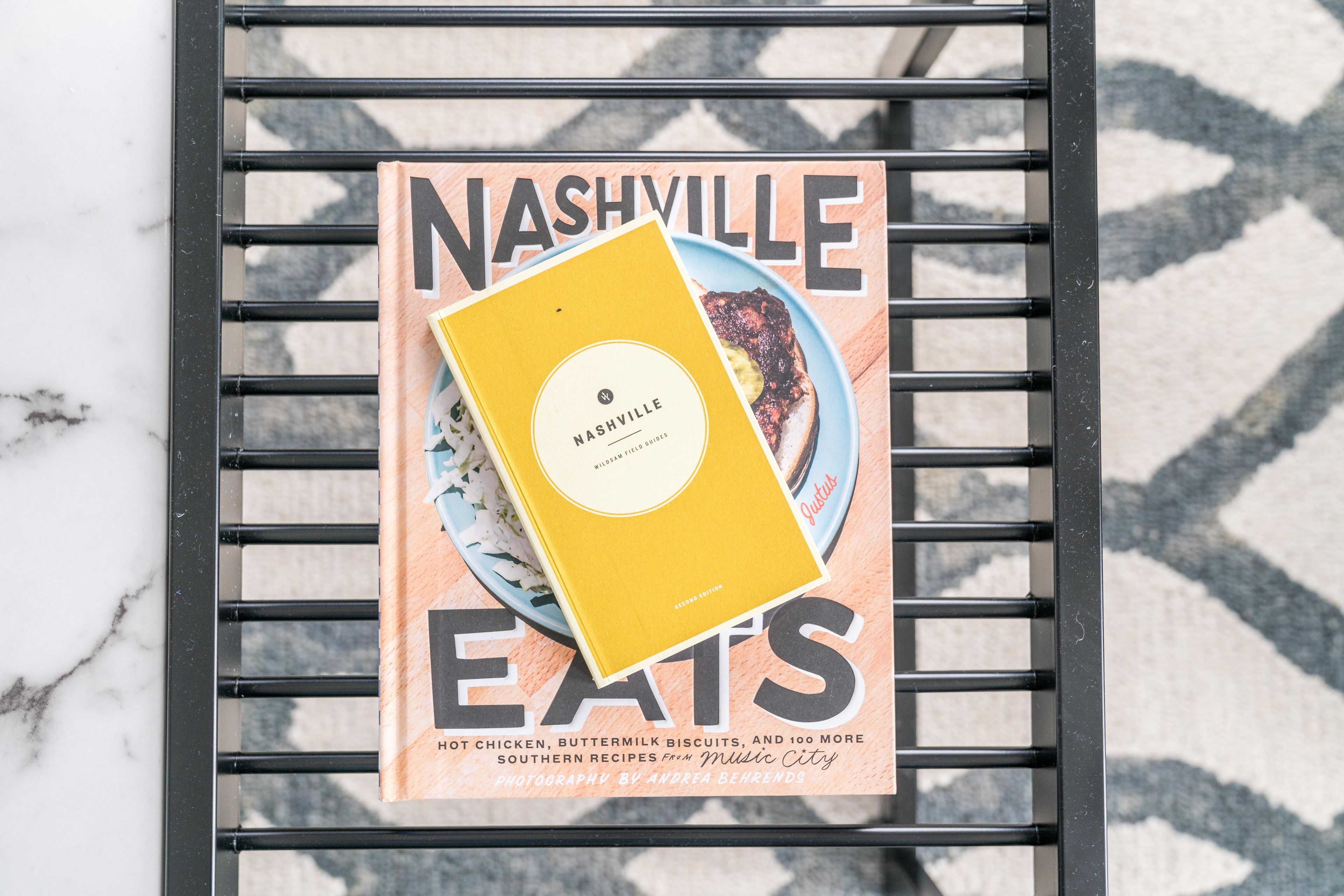 A magazine titled 'Nashville Eats' with a cover featuring a dish and text about Southern recipes.