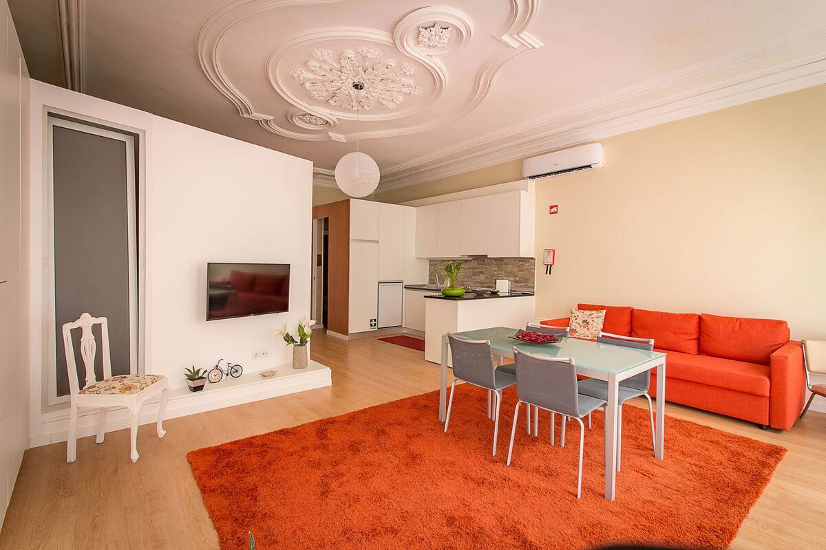 Apartment, 1 Bedroom, City View (Calla Lily) | Living room | Flat-screen TV