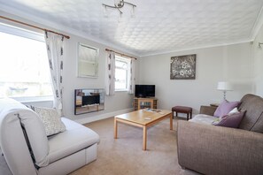 Ferienhaus | Wohnbereich | Fernseher