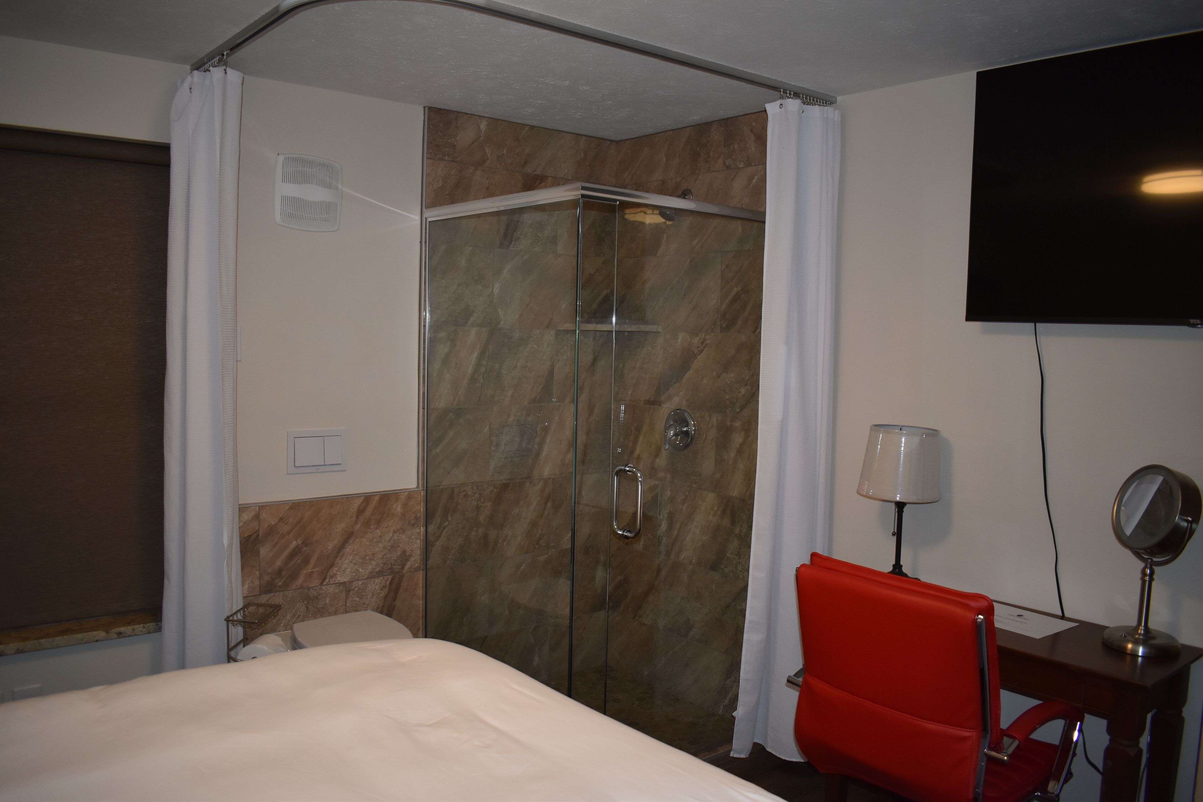 studio, 1 queen bed | bathroom | shower, hydromassage showerhead, designer toiletries, hair dryer