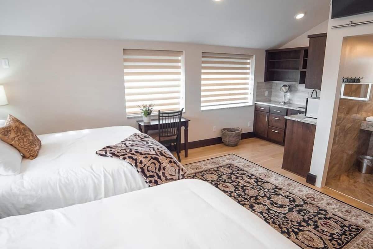 deluxe room, 2 queen beds, non smoking | desk, blackout curtains, free wifi, bed sheets