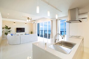 Suite | Private kitchen | Fridge, microwave, stovetop, electric kettle