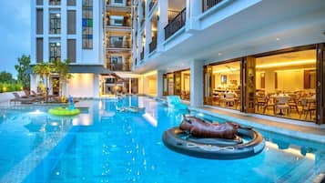 Outdoor pool, open 7:00 AM to 11:00 PM, sun loungers