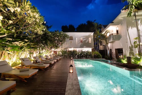 Outdoor pool, open 6:00 AM to 11:00 PM, pool umbrellas, sun loungers