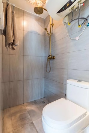 Shower, free toiletries, hair dryer, slippers