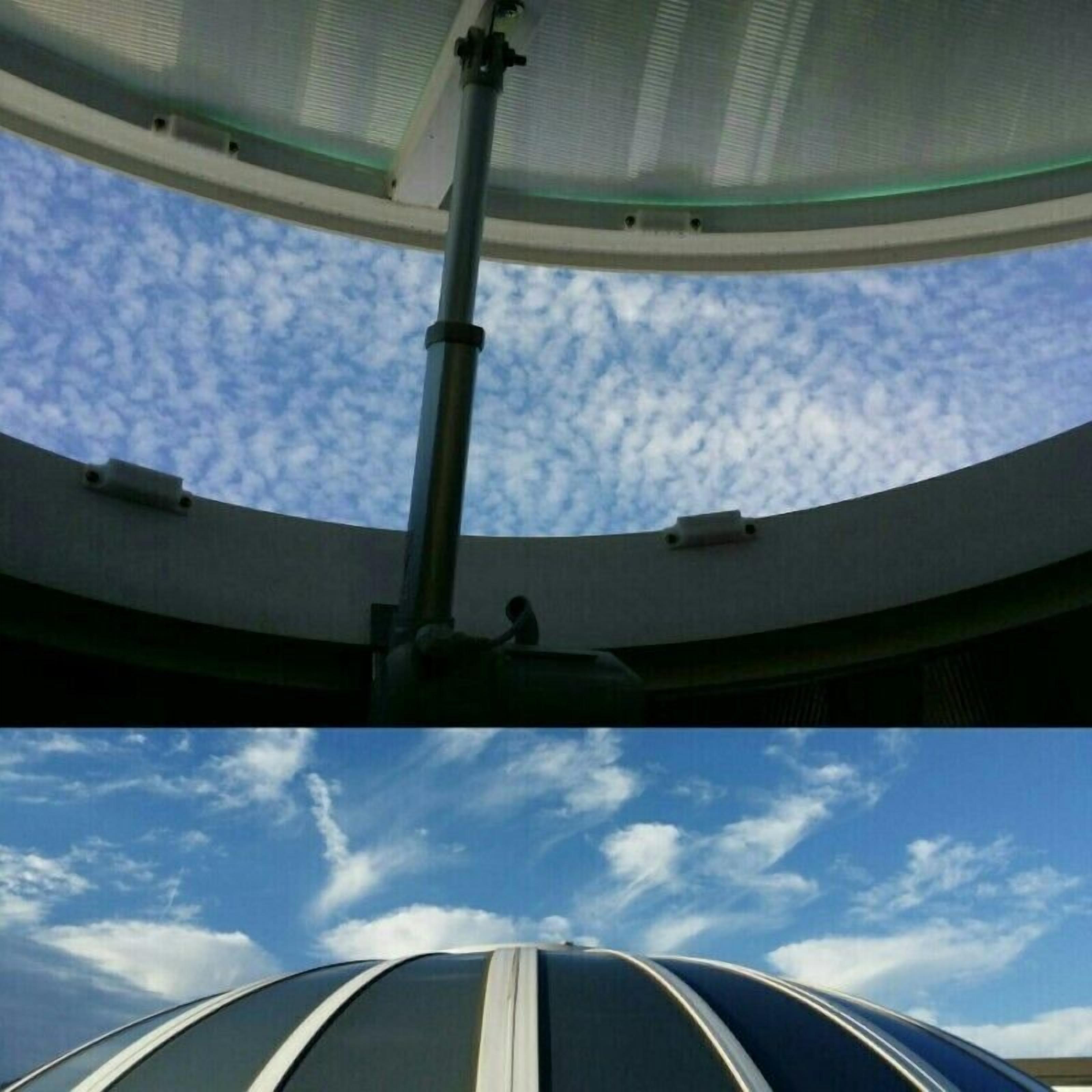 A circular observation deck with a clear view of the sky.