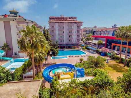 3 outdoor pools, open 9:00 AM to 6:00 PM, pool umbrellas, sun loungers