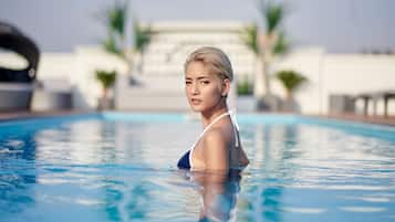 Outdoor pool, open 8:00 AM to 8:00 PM, pool loungers