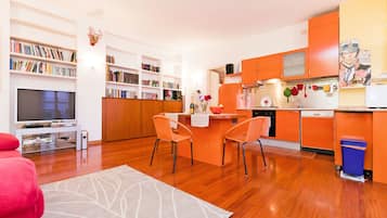 Departamento, 1 habitación | Área de sala de estar | Televisión de pantalla plana