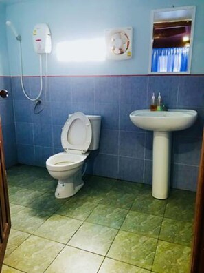 Standard Double Room | Bathroom | Shower, free toiletries - We Care Resort (Wichian Buri)
