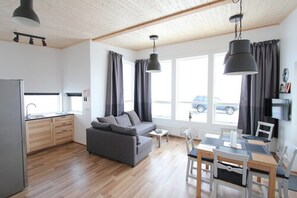 Cabin, 2 Bedrooms | Living area | Flat-screen TV - Blue View Cabin 4A with Hot Tub (Bláskógabyggd)