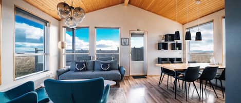 Deluxe Cabin, 2 Bedrooms | Living area | Flat-screen TV