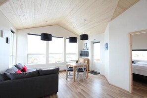 Cabin, 2 Bedrooms | Living area | Flat-screen TV - Blue View Cabin 6A with Hot Tub (Bláskógabyggd)