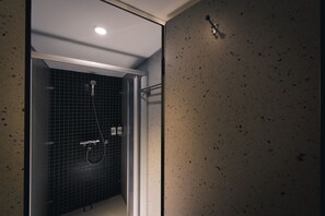 Shower, rainfall showerhead, hair dryer, towels
