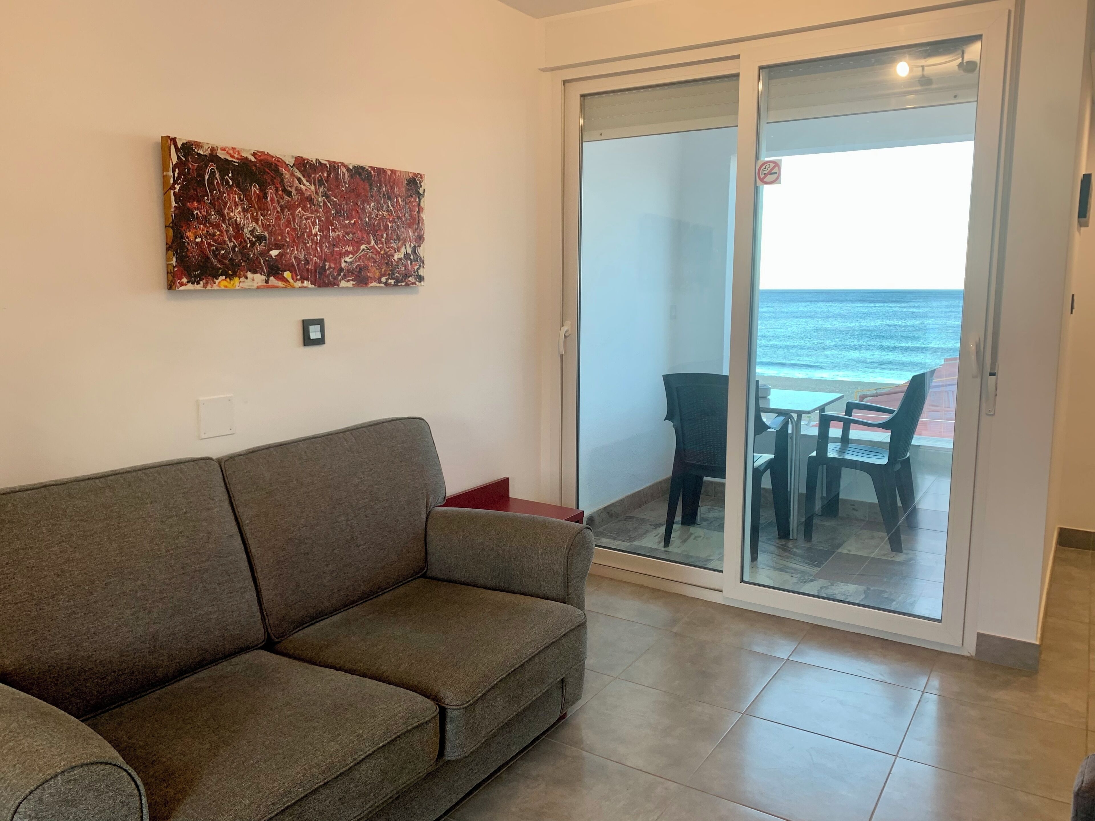 superior double room | living area | flat-screen tv