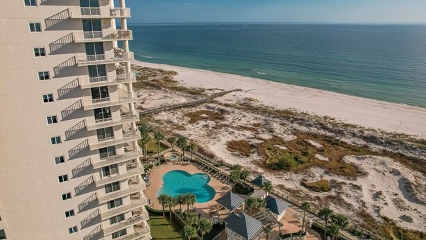 A high-rise hotel with a pool and beach access. - Beach Club Bristol 202 2 Bedroom Condo by RedAwning (Gulf Shores)