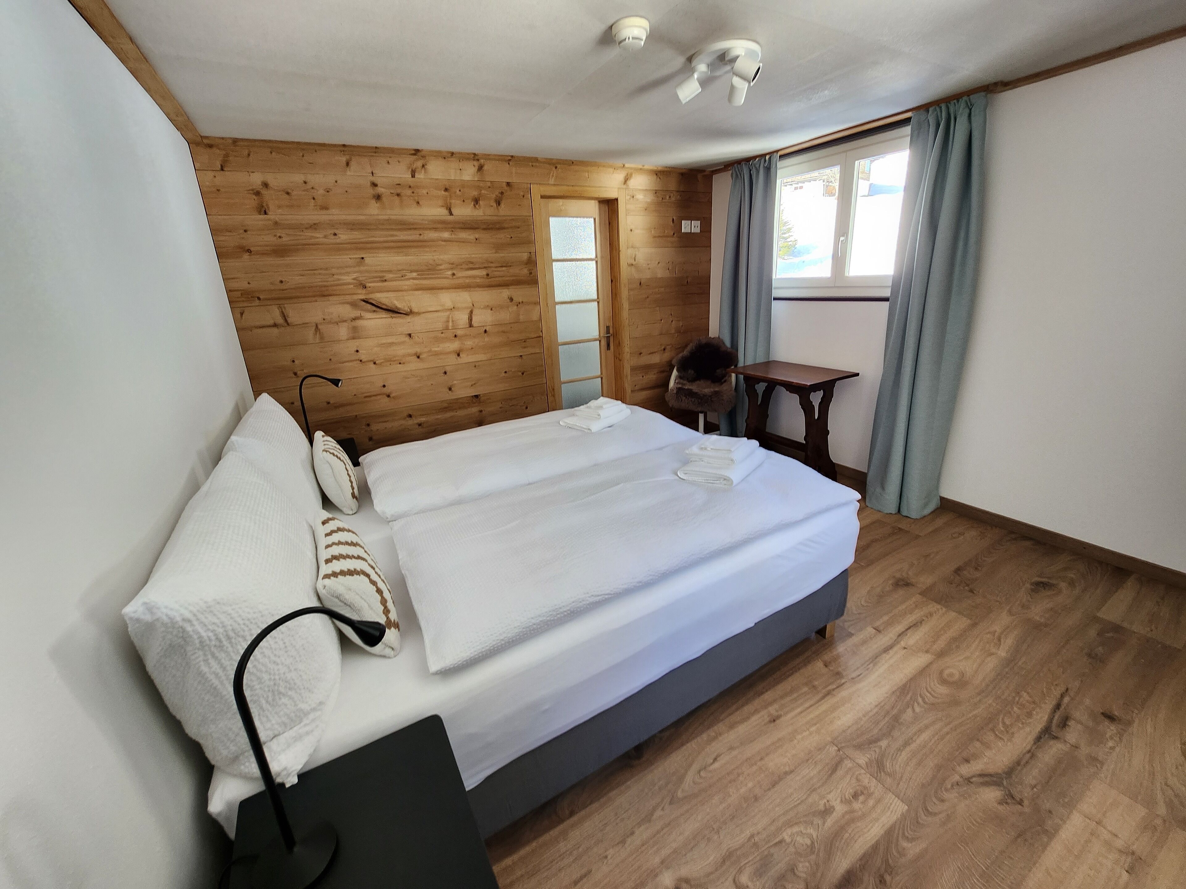 Premium bedding, desk, laptop workspace, free WiFi